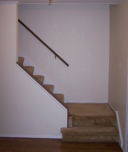 Before hardwood stair replacement