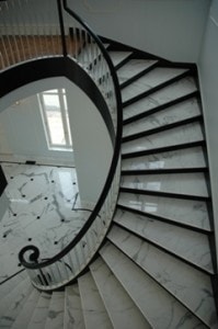 Curved stair with marble treads