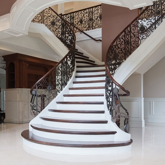 Boston - Curved staircase with iron balustrade